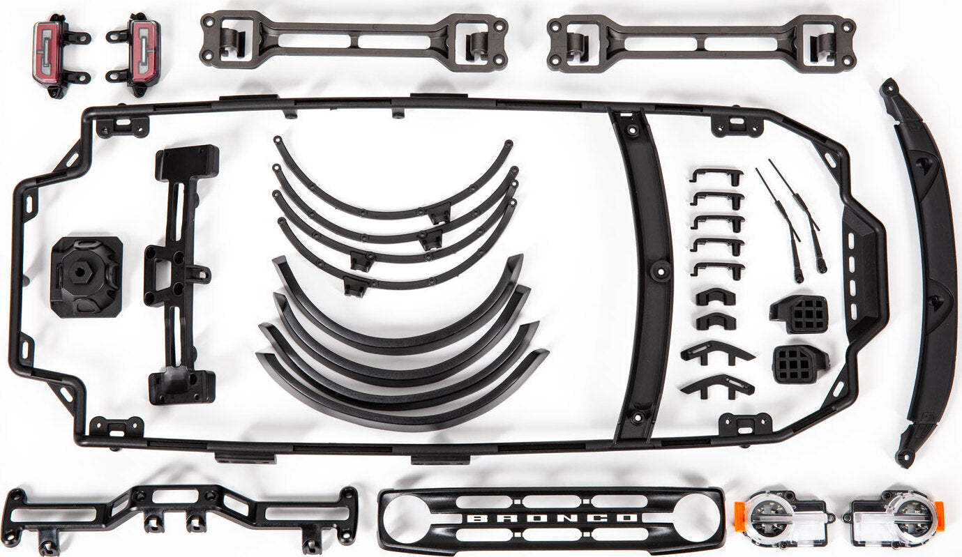 Body, Ford Bronco (clear, requires painting)/ decals/ window masks (includes grille, side mirrors, door handles, fender flares, windshield wipers, spare tire mount, clipless mounting, hardware) (requires #8080X inner fenders)